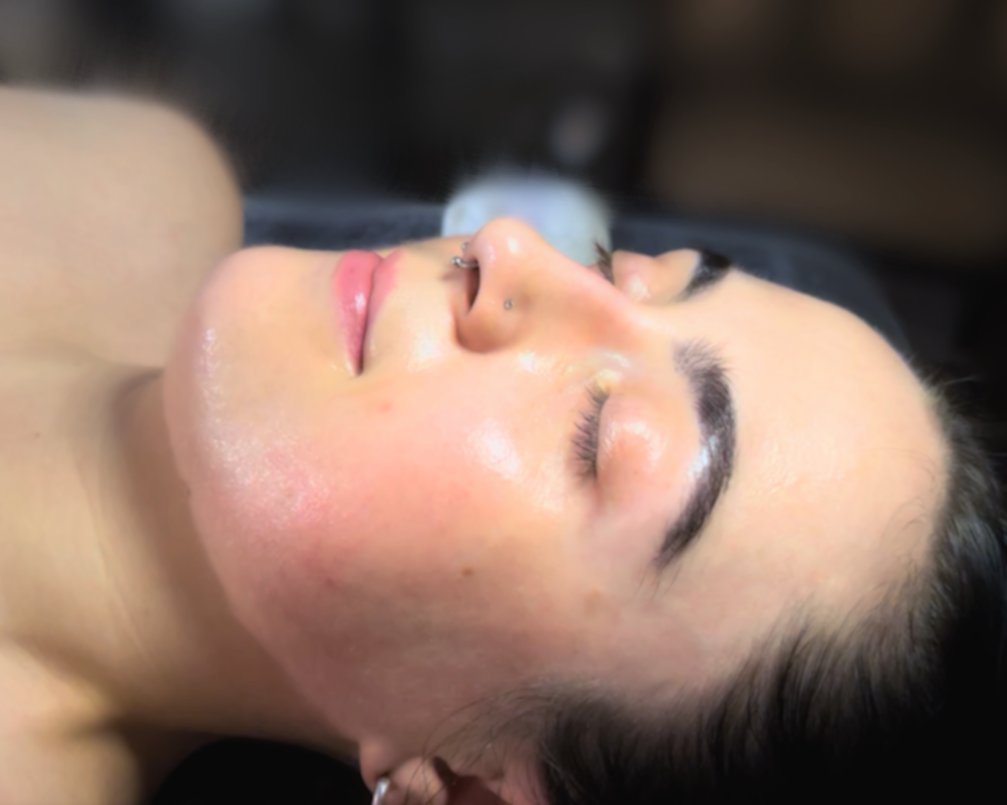 Client also receiving facial treatment